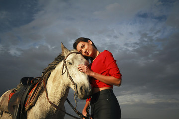 white horse and beautiful young woman. Fashion model with her white horse, Freedom, happiness, summer. Love 