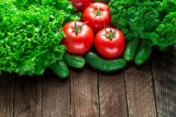 Fresh vegetables on wooden background
