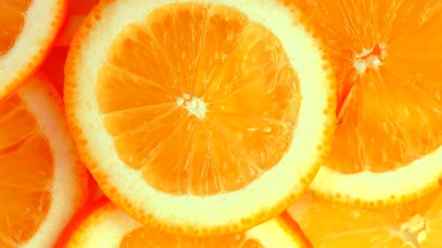 Closeup of a delicious ripe orange rotate. 4K UHD video 3840x2160