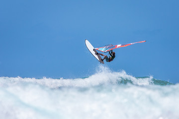 Windsurfer jumping