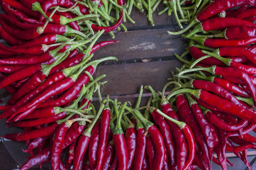 Chilli pepper on wooden background