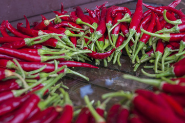 Chilli pepper on wooden background