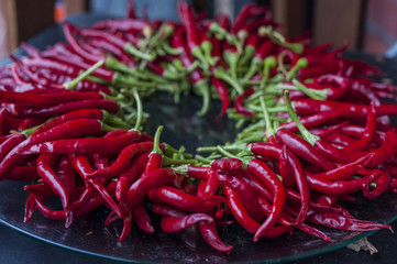 Chilli pepper on wooden background