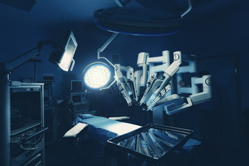 Surgical room in hospital with robotic technology equipment, machine arm surgeon in futuristic operation room. Minimal invasive surgical inoovation, medical robot surgery with 3D view endoscopy - obrazy, fototapety, plakaty