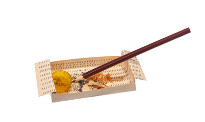 A punch card in the form of an ashtray and a sharpener and a pencil.