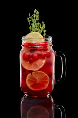 Cold cranberry mint cocktail with rosemary