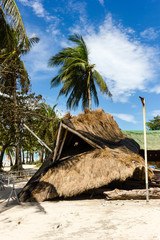 A large traditional roof completely blown off by a super typhoon