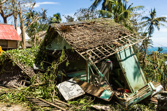 A wooden shack completely destroyed by the passage of a super typhoon / hurricane