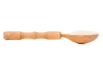 Wooden spoon with rice