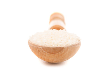 Fototapeta na wymiar Wooden spoon with rice