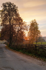 Fototapeta premium Rural autumn landscape at sunset time.