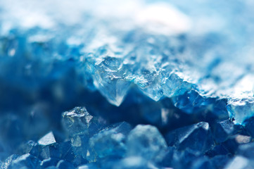 Winter cold background, blue crystals. Macro