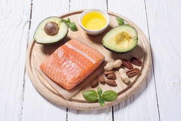 Healthy food vegetables , nuts and salmon