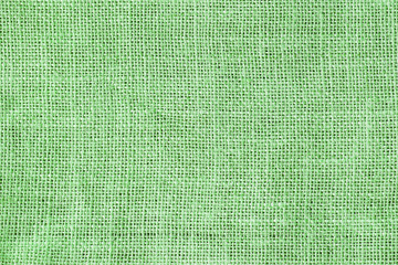 Fototapeta premium Green light sackcloth texture Christmas background