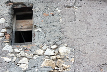 Ruined house wall with window