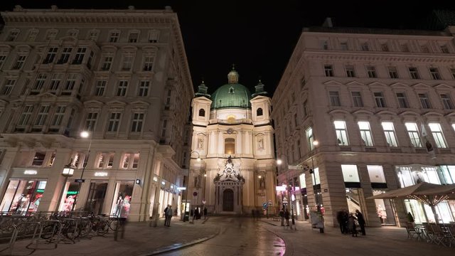 Night timelapse of Peterskirche in Vienna