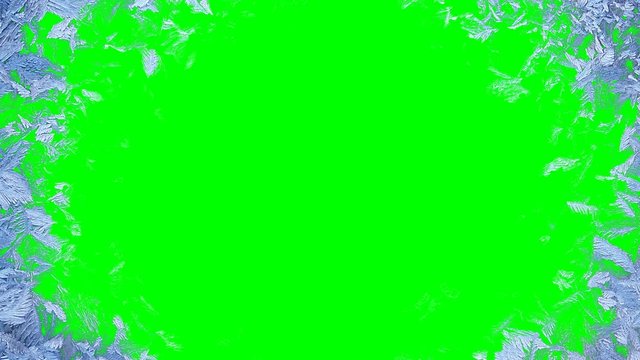 Beautiful window freezing animation from borders to center, timelapse frost forming transition, natural crystal icing, isolated on green chroma key background matte, alpha channel.