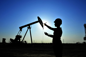 The oil workers in the job