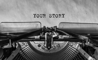 your story typed words on a Vintage Typewriter. Mechanisms closeup. Typing on old typewriter