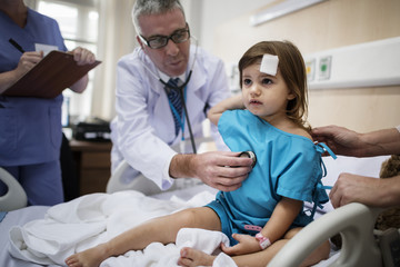 Sick little girl in a hospital