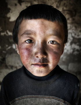 Portrait of a Mongolian boy.