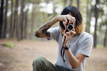 A photographer in the forest