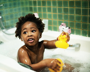 African descent kid bathing