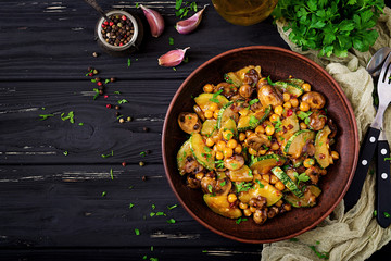 Vegan stir fry of mushrooms, zucchini and chickpea