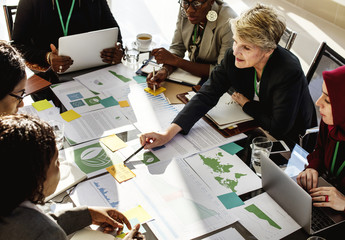 A Group of International Business People Are Having a Round Table Meeting