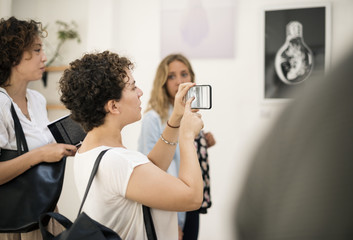 people checking out the exhibition