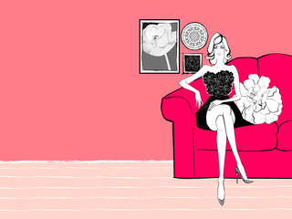 ピンクのソファと女性