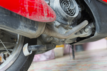 Fototapeta premium Mud stain on motorcycle at back inside on engine and wheel