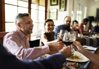 Group of diverse friends are celebrating together