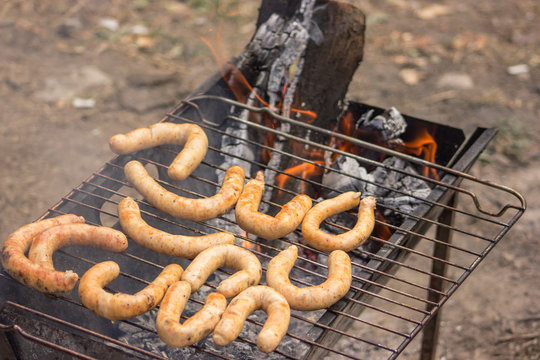 outdoor bbq with sausage