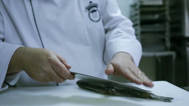 closeup of food preparation  cheff hands while in kithcen