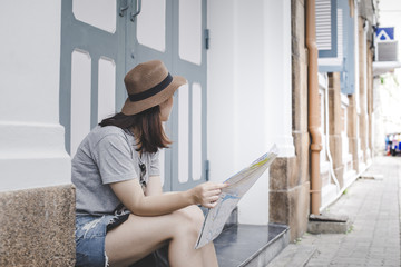 young women with backpack travel architecture location in thailand