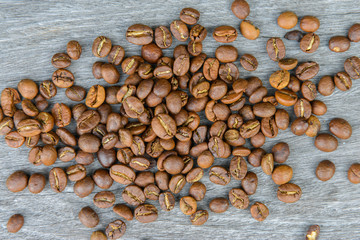 Coffee bean on the wooden background