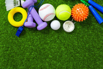 Various sport tools on grass