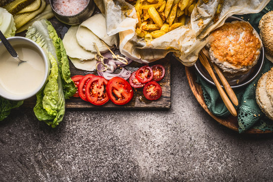 Tasty Ingredients For Chicken Burger On Rustic Background , Top View, Border