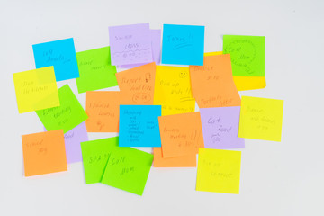 To do list - multicolored task notes on white wall