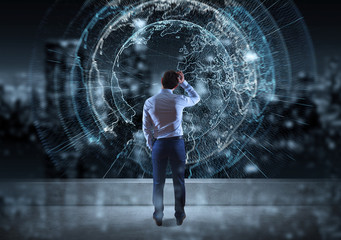 Businessman watching digital planet earth interface on a rooftop 3D rendering