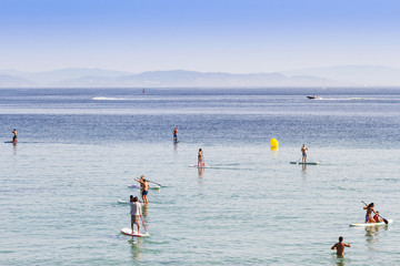 Practicing paddle surf