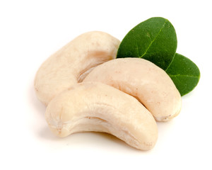 cashew nuts with leaf isolated on white background. macro