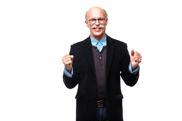 Happy senior businessman in a victory pose on white background