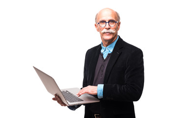 Smiling handsome mature male with his laptop against a white background