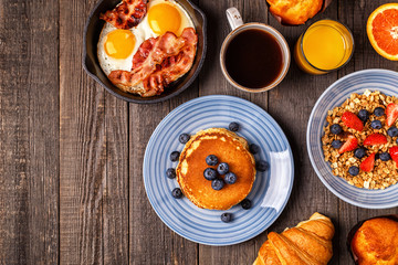 Delicious breakfast on a rustic table.