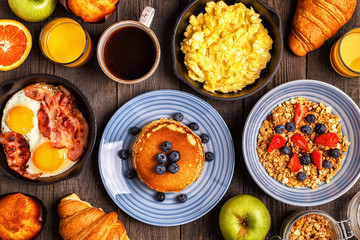 Delicious breakfast on a rustic table.