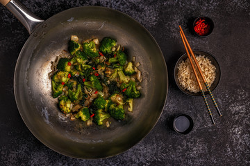 Cooking asian wok with stir fry vegetables