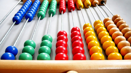 Perspective Abacus for Counting Practice, Beads Aligned Diagonally on Gray Background