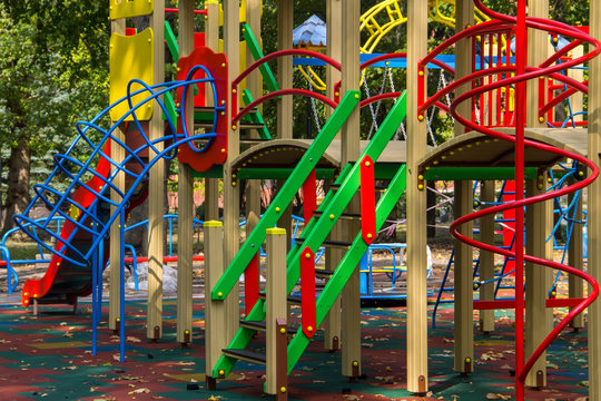 Colorful playground equipment for children in public park